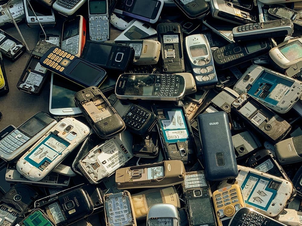 A pile of old mobile phones collected for recovery of copper, gold and silver