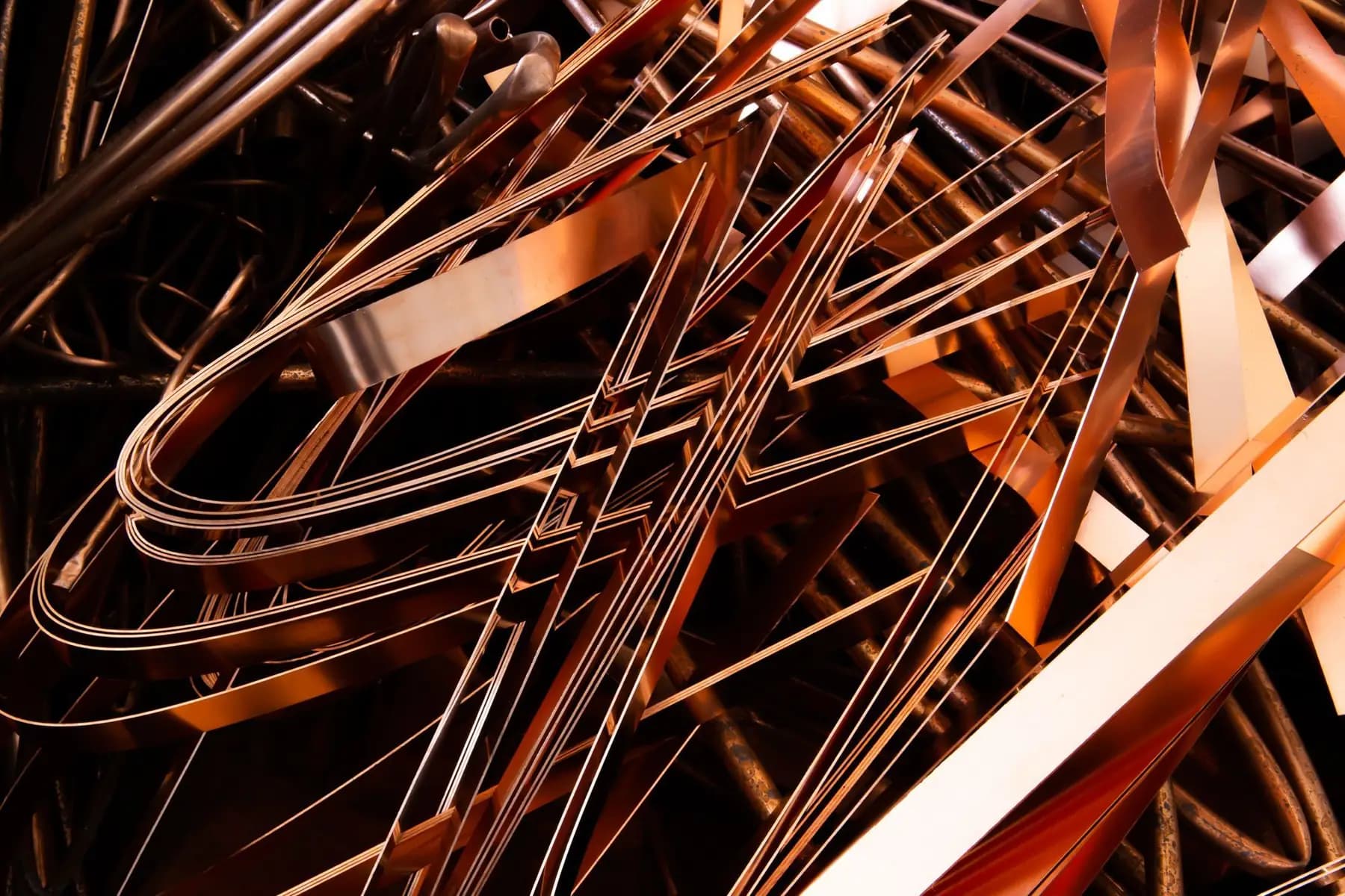 Shiny strips of recovered copper and metal scrap